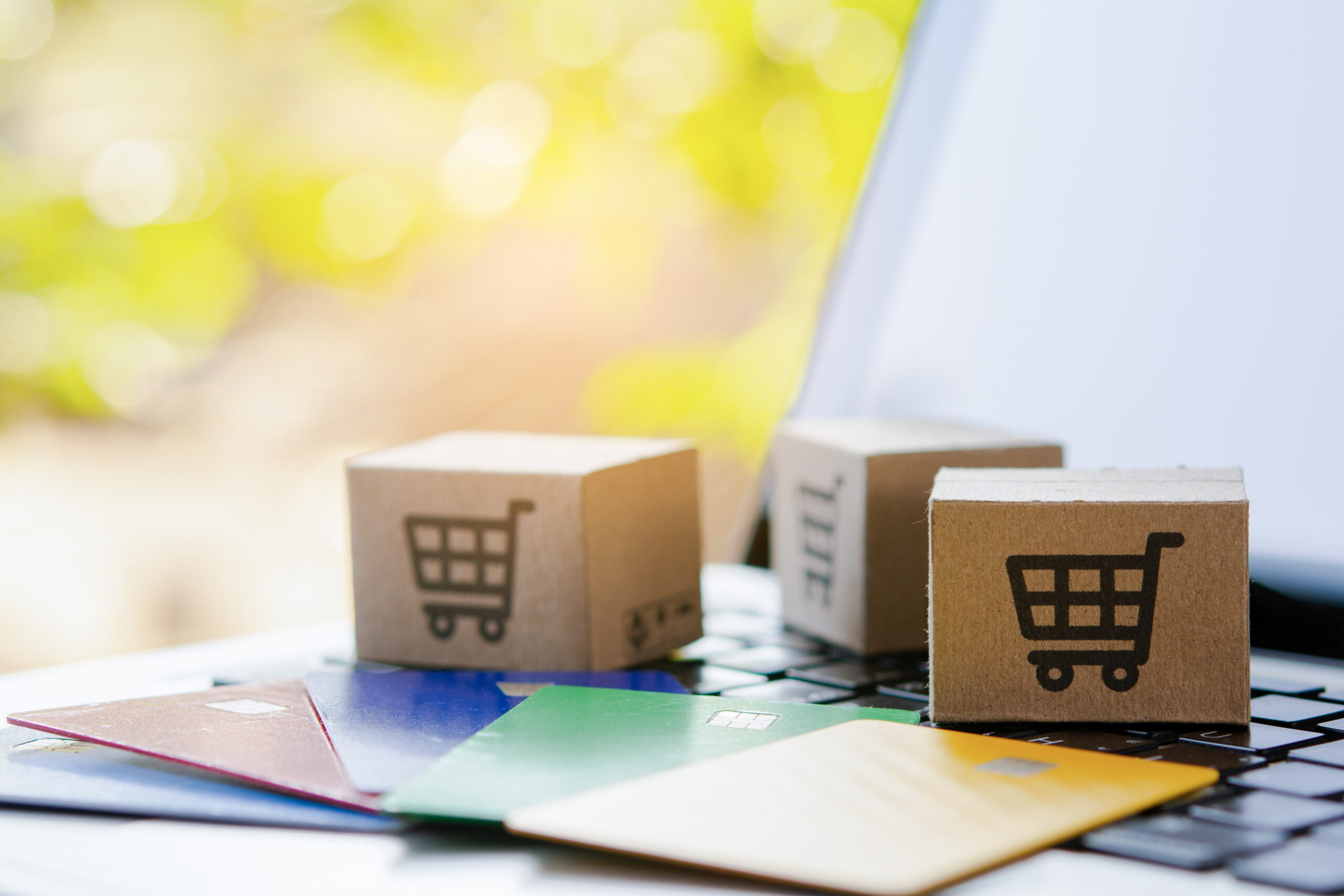 shopping online. credit card and cardboard box with a shopping c